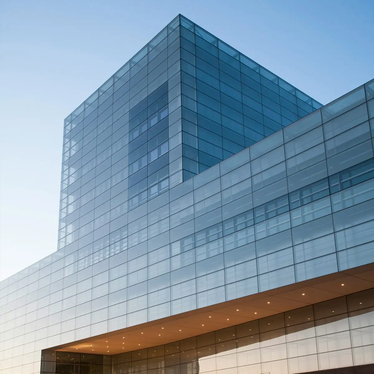 photo of a building exterior with mirrored glass