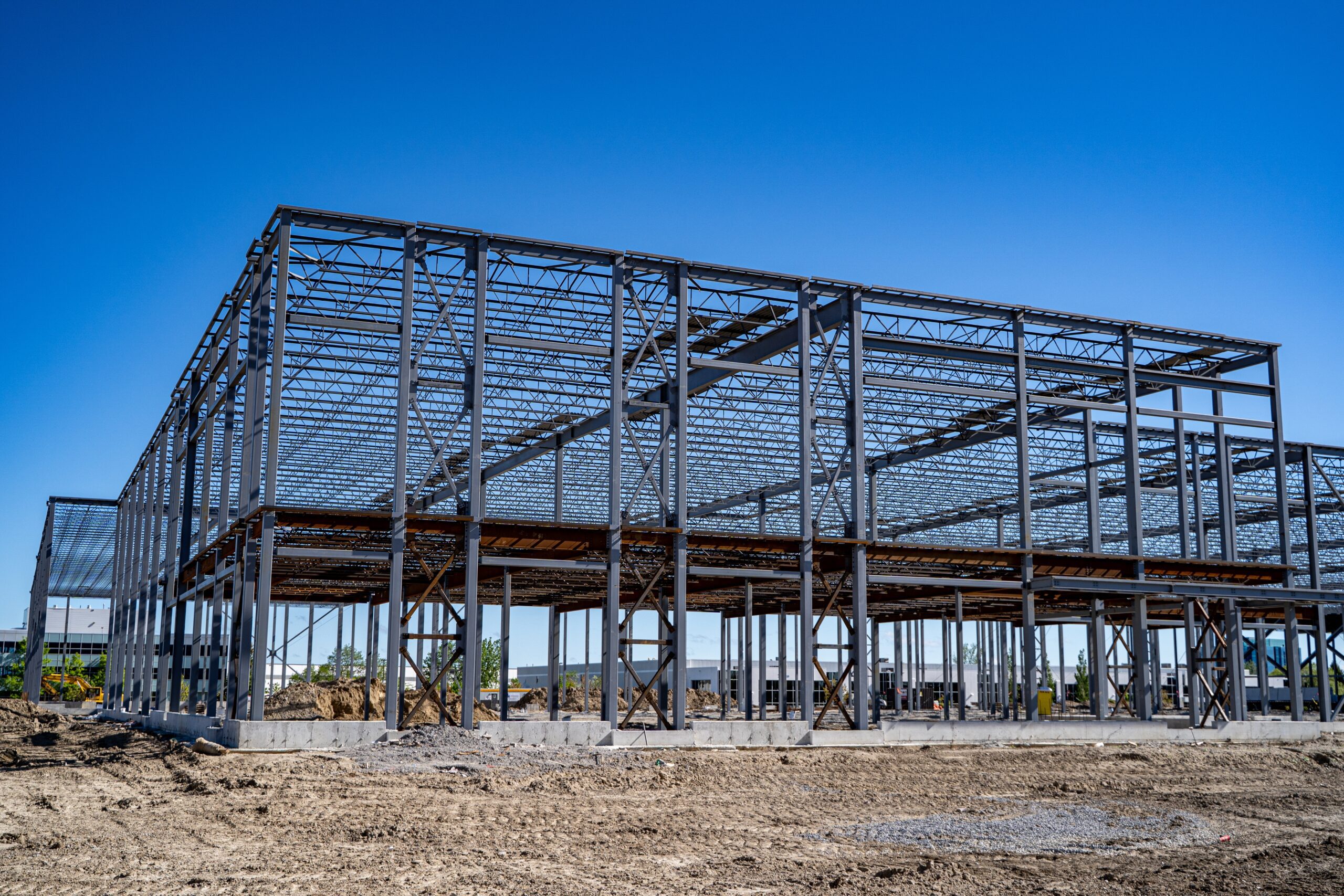 Steel,Frame,Structure,Under,Construction,At,Industrial,Site.